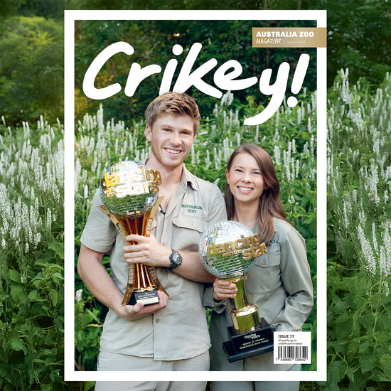 Australia Zoo magazine cover featuring a man and woman holding trophies with 'Crikey!' branding.
